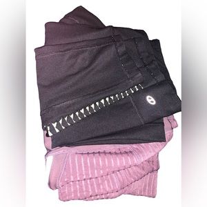 A bundle of two leggings/Both are large mauve colored on are 10% spandex